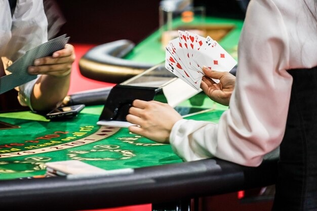 ini555 app interface showing sportsbook markets and live-dealer table selection
